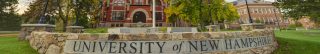 photo of university of new hampshire sign and main buildings